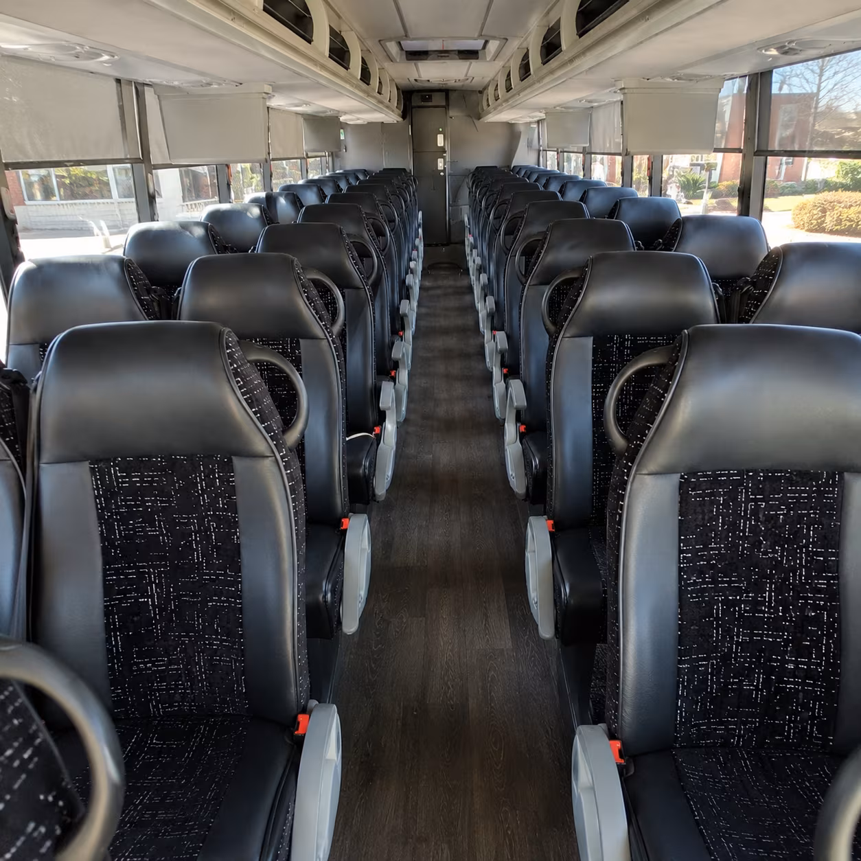 millcreek 56 passenger charter bus inside